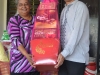 GM Tang with Ms. Devanasam, The home's founder